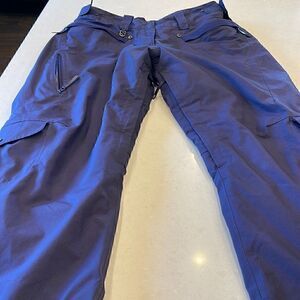 Solomon ski pants size Med. Excellent condition, navy blue purple color, nice.